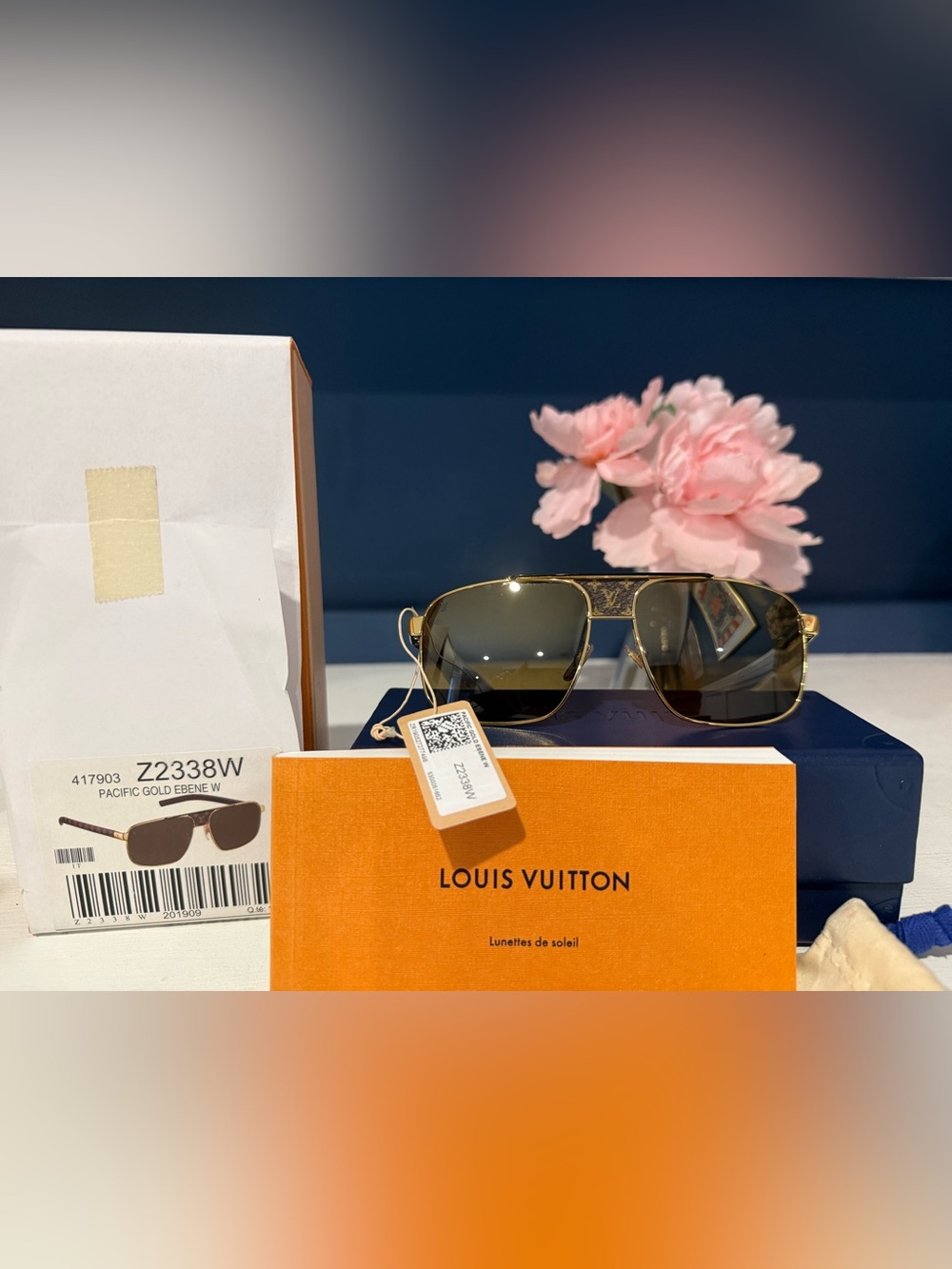 Louis Vuitton sunglasses gold frame with monogram details full inclusion